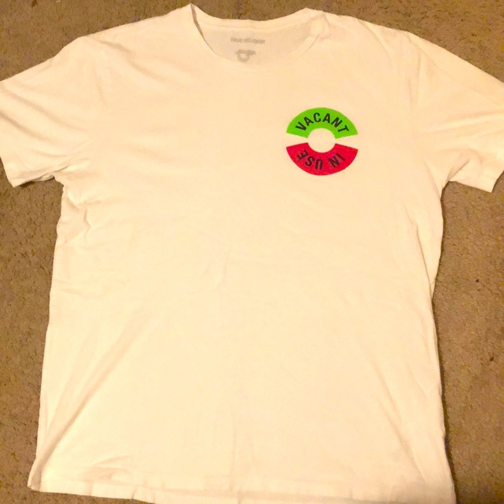 A white true religion shirt